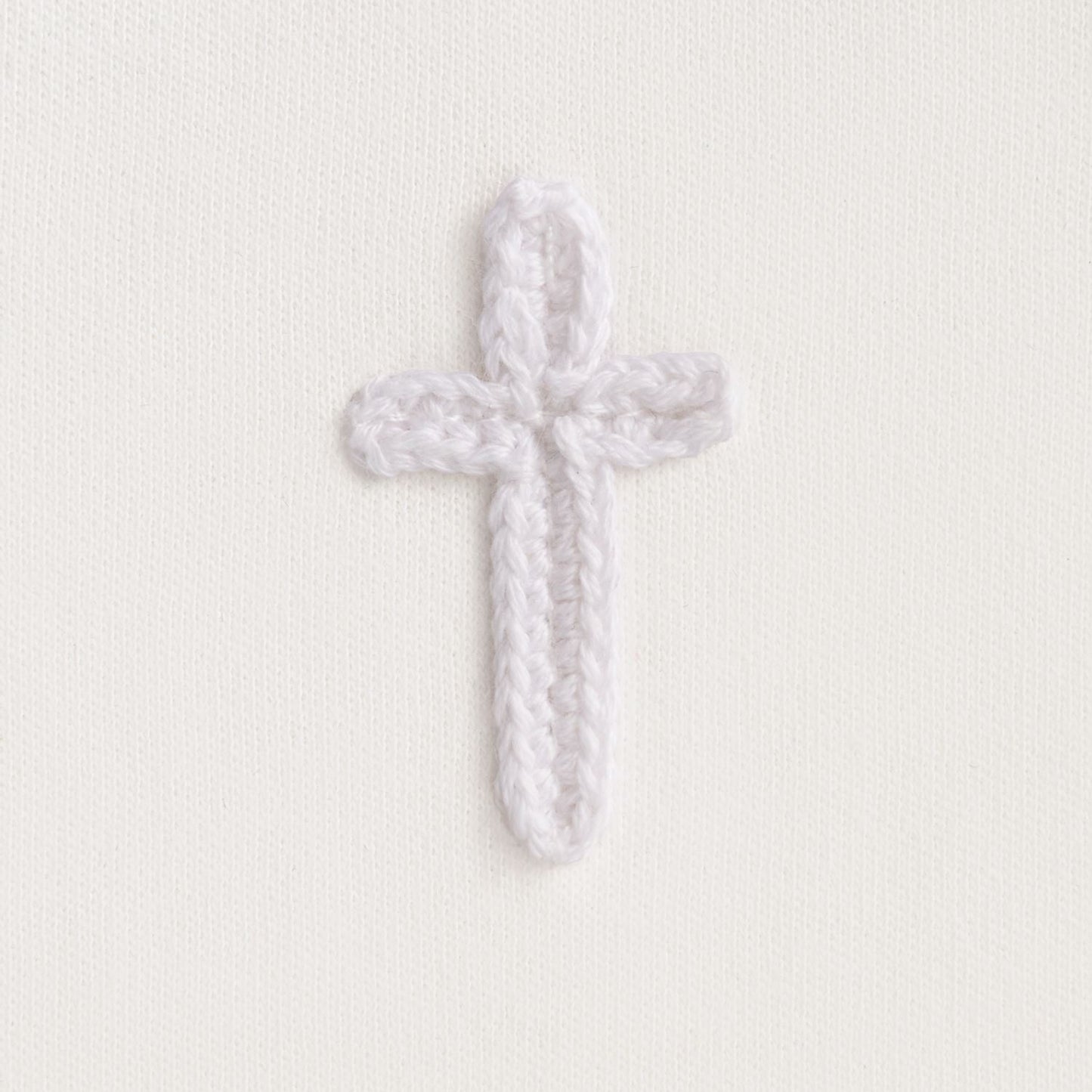 Mudpie Ivory Cross Bib