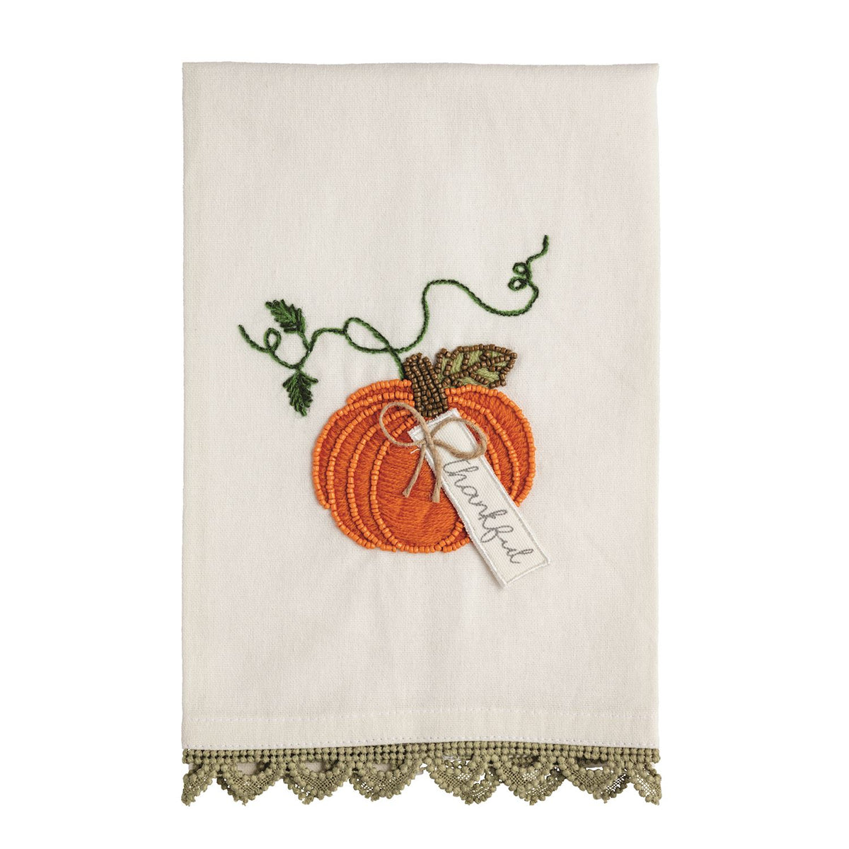 Decorative towel with embroidered pumpkin and leaf design with a tag that says thankful on a white background