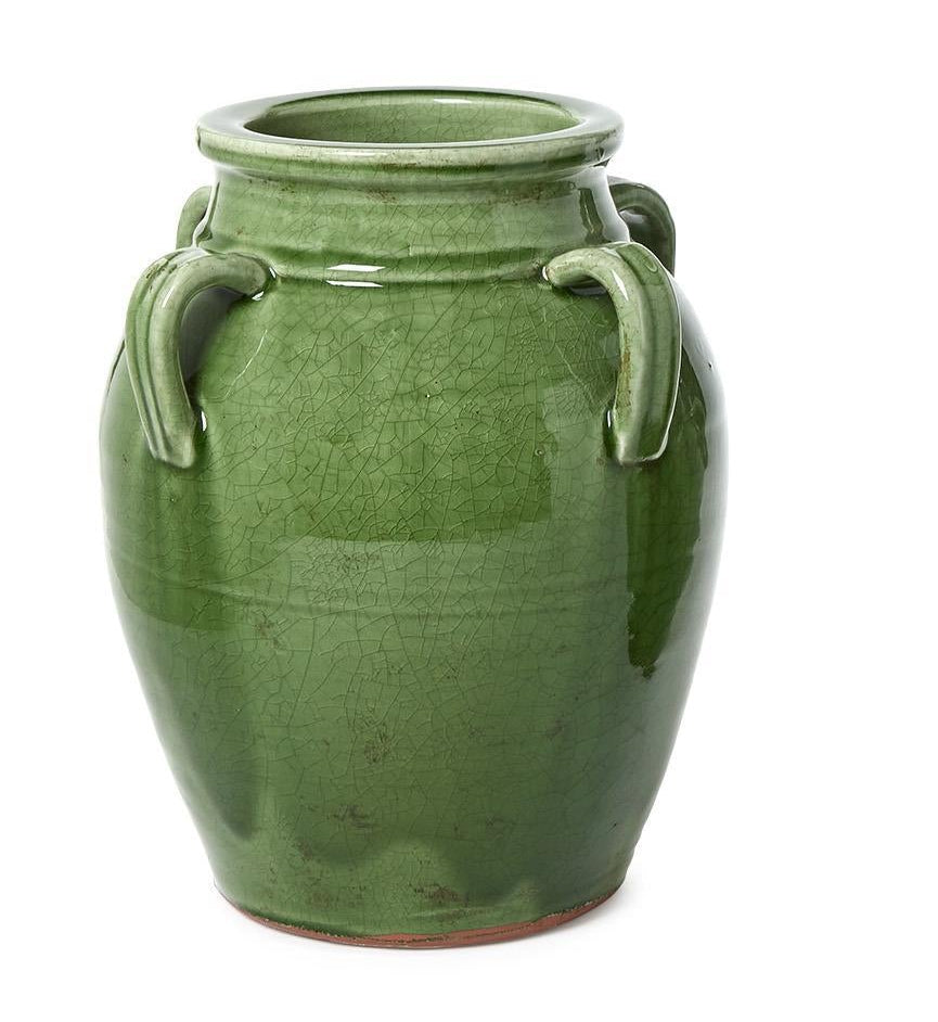 Large green ceramic vase with handles on a white background