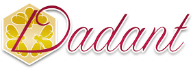 A logo featuring a stylized yellow flower inside a gold hexagon on the left, next to the word 'Dadant' in red cursive script on a white background available at the Little Exchange Boutique in Oakwood Ohio, just south of Dayton Ohio