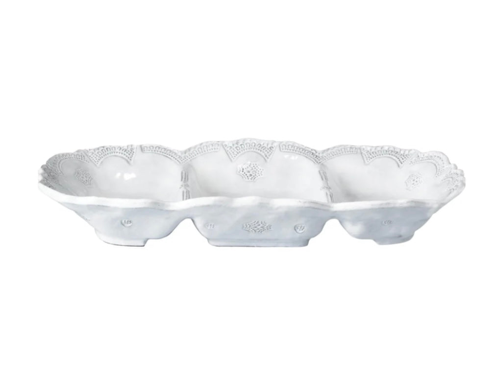 A white ceramic three-part server with intricate floral lace patterns.