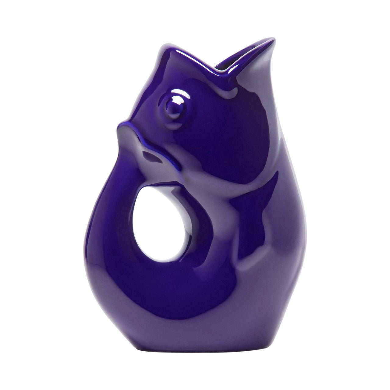 A small ceramic fish-shaped creamer pitcher in cobalt blue color with a gurgle feature.