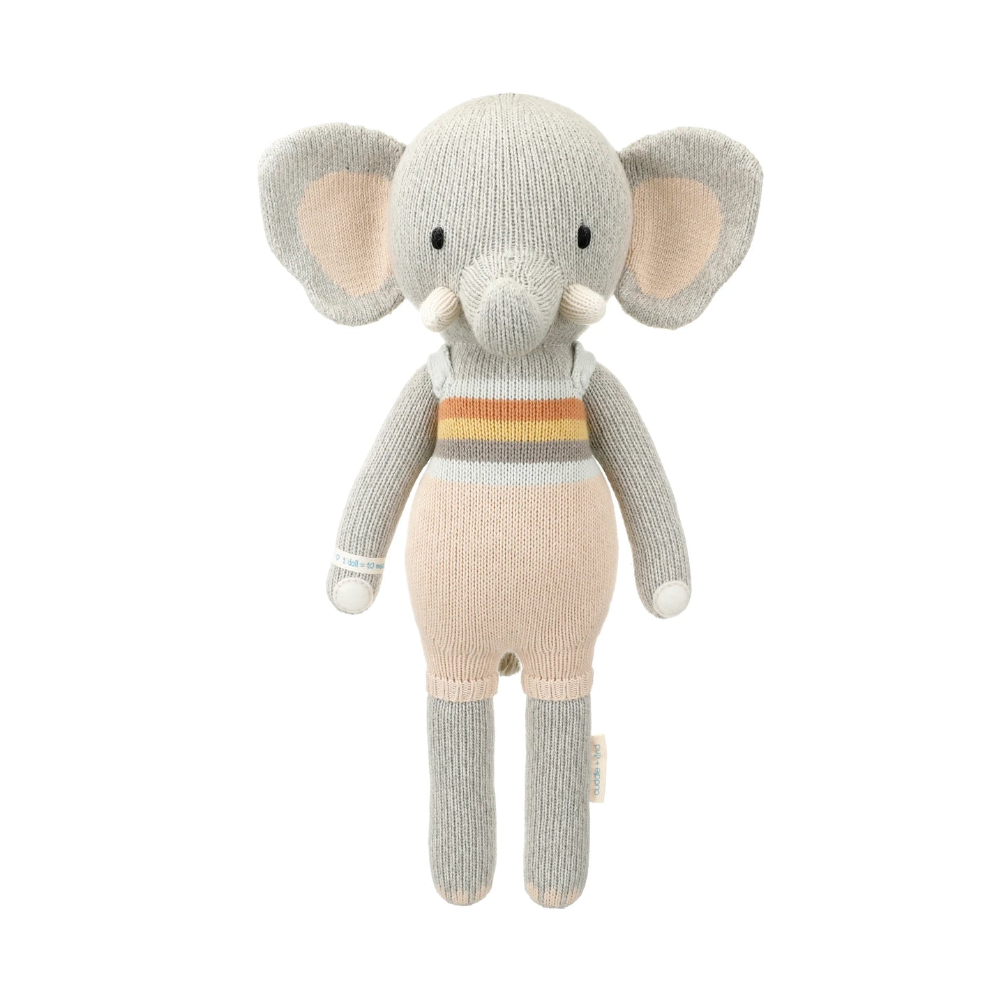 Knitted toy elephant with a striped sweater on a white background
