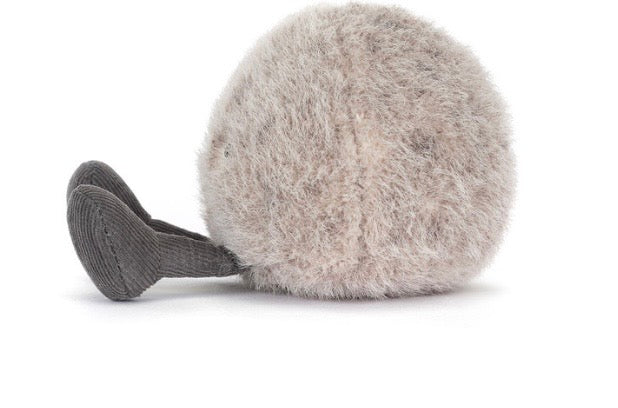Gray fuzzy ball with a textured handle on a white background