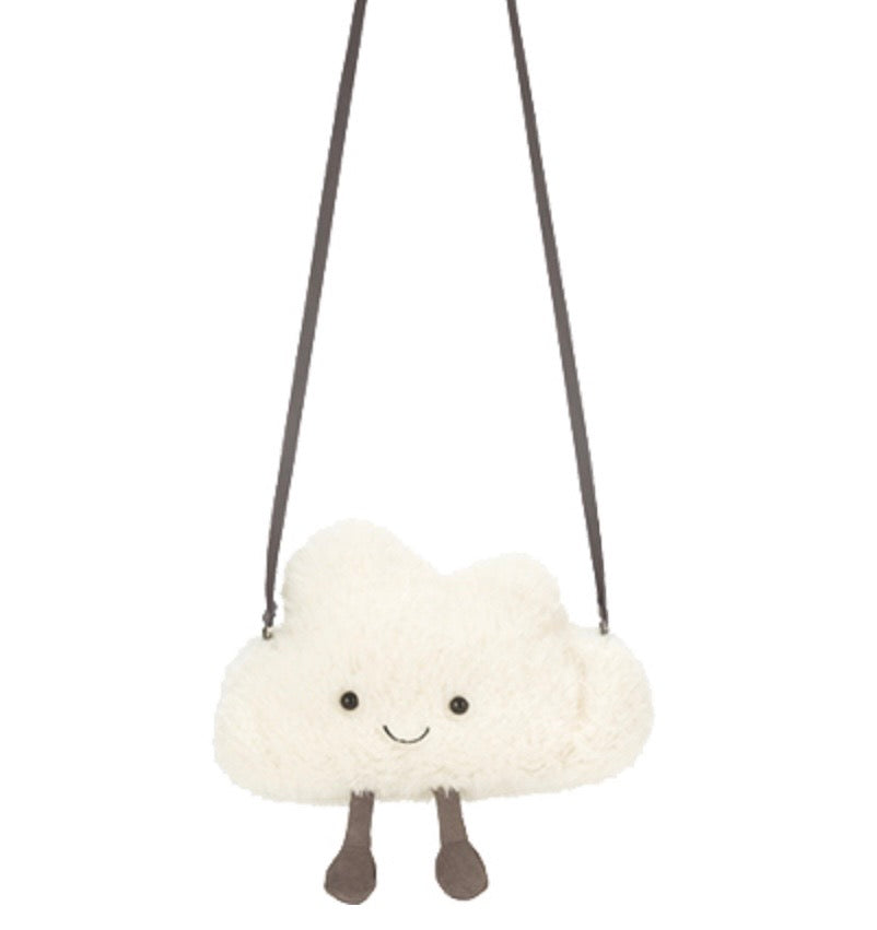 Plush cloud-shaped toy with a smiling face on a white background