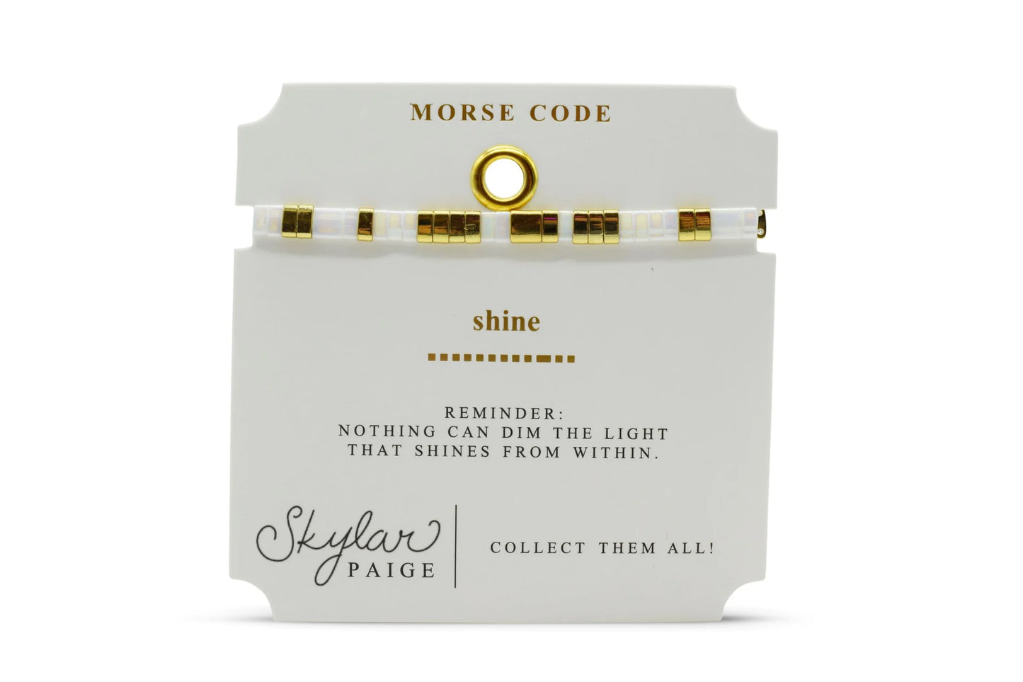 Skylar Paige 'Morse Code' packaging with a white and gold bead bracelet and the text "shine"