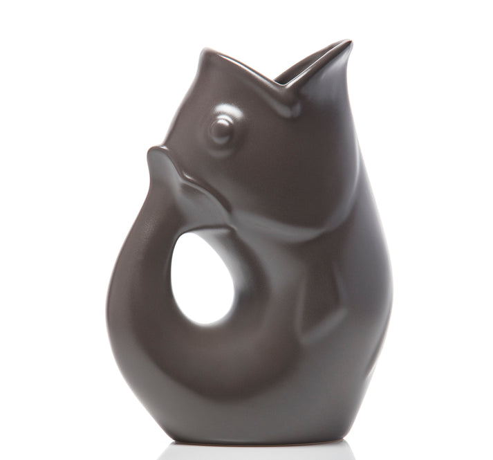 A small slate ceramic fish-shaped creamer pitcher with a gurgle feature, suitable for serving creamer, syrup, or as a bud vase.