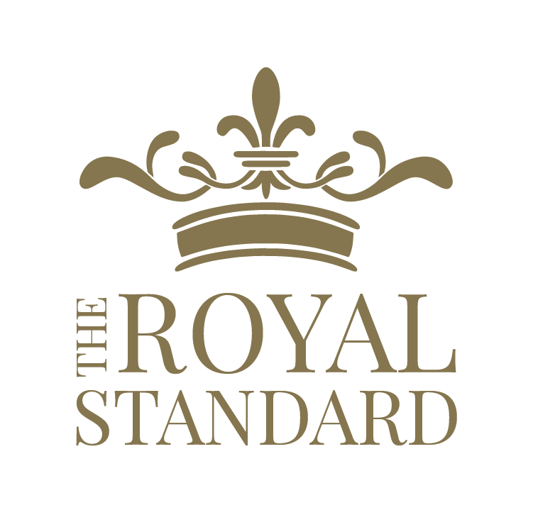 The Royal Standard logo featuring a gold crown emblem above the text 'THE ROYAL STANDARD' in a matching serif font, set against a plain white background sold at The Little Exchange Fine Gifts in Oakwod, just south of Dayton Ohio.
