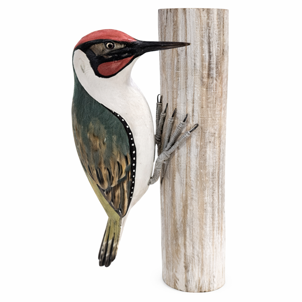 A decorative woodpecker sculpture perched on a vertical weathered wood post