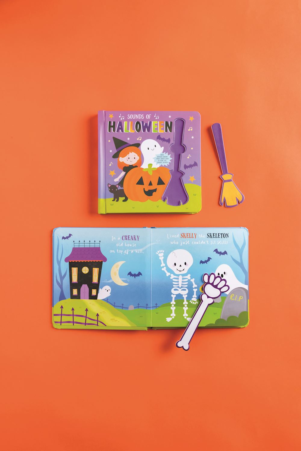 Halloween-themed Sounds of Halloween book on an orange background