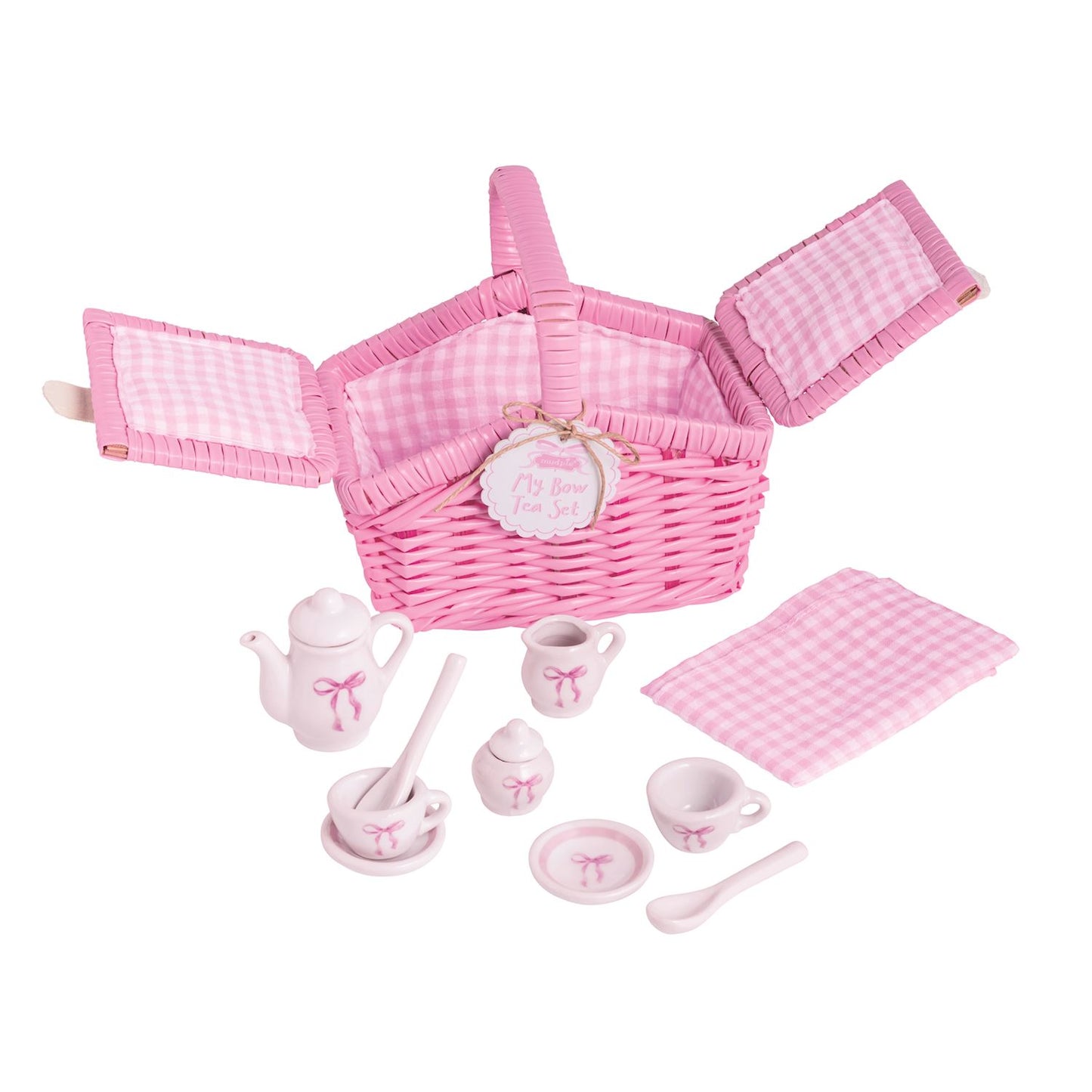 Pink wicker picnic basket with matching tea set with bows on a white background