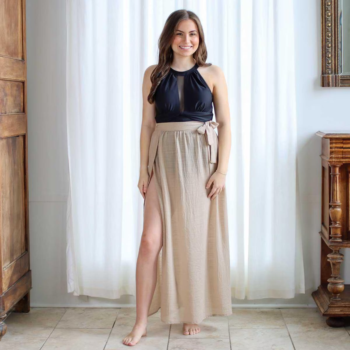 a beige coverup sarong with a tie waist