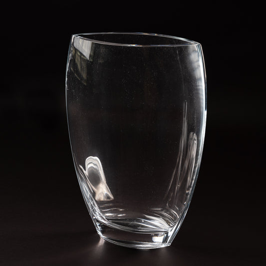 An oval, lead-free crystal vase with a sleek design.
