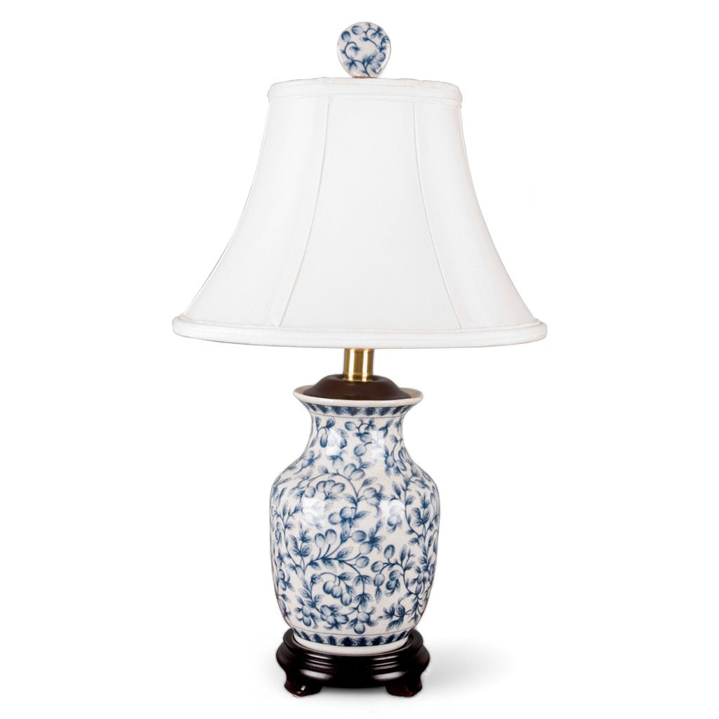 Table lamp with white shade and blue floral pattern 