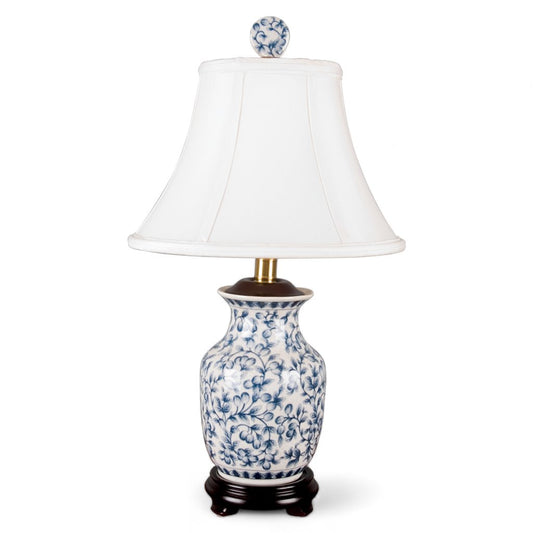 Table lamp with white shade and blue floral pattern 