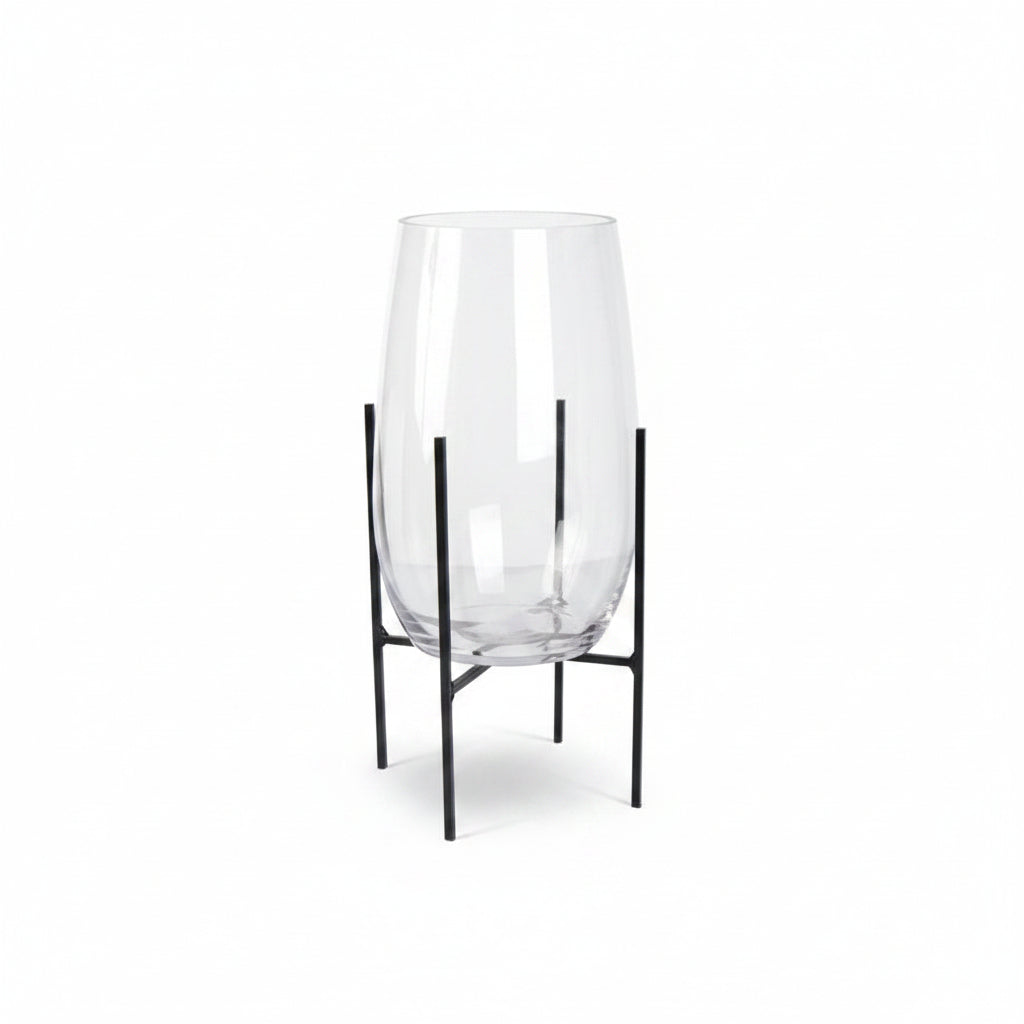 A small clear glass vases with black metal stands, shown on a white background. by K&K interiors

