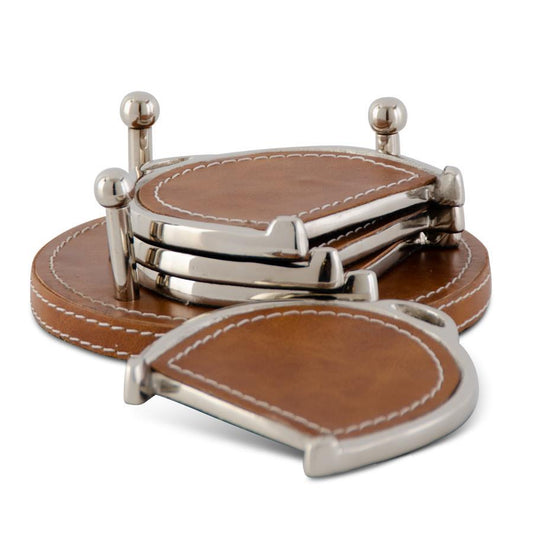 Set of leather coasters with metal holder on a white background
