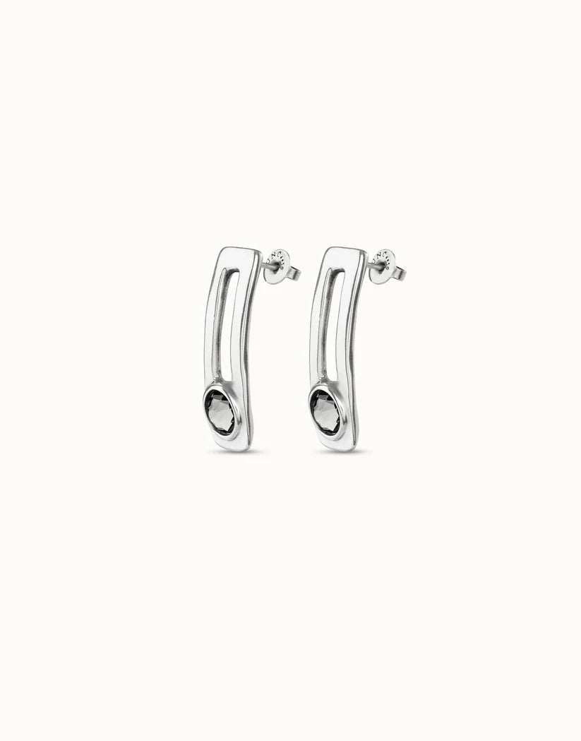 Metallic cylindrical UNOde50 earrings  on a white background
