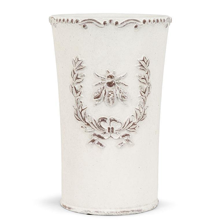 Decorative white vase with bee and laurel wreath design on a white background