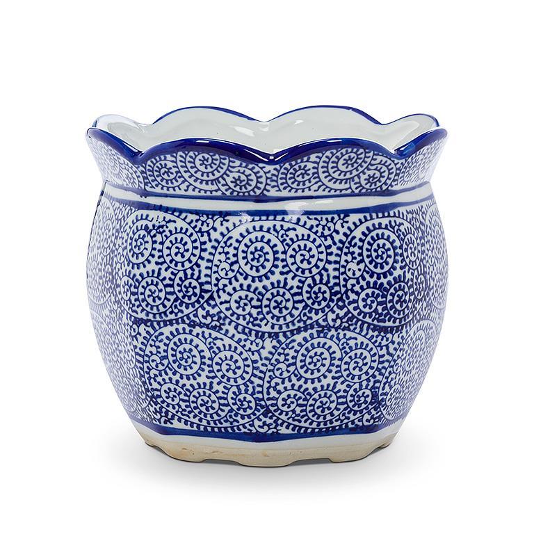Blue and white planter with a scallop edge resembling Chinese porcelain