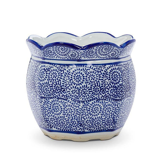 Blue and white planter with a scallop edge resembling Chinese porcelain