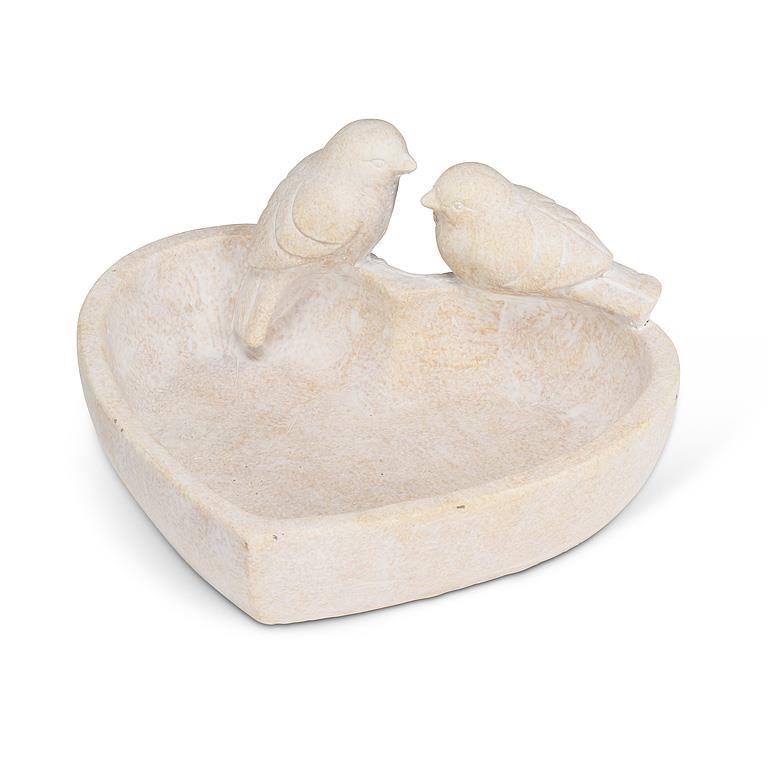 heart shaped cement dish with 2 birds perched on the edge