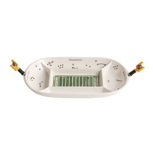 A divided snack platter made to look like a football field with football plays graphics and 2 spreaders that look like a goal post