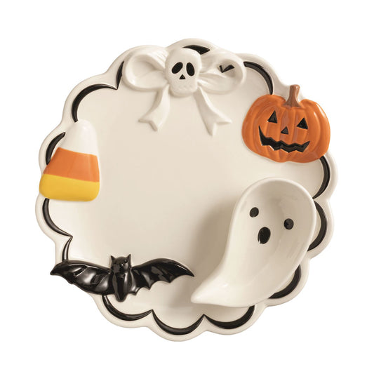 Decorative Halloween plate with ghost bowl, pumpkin, candy corn, and bat designs 