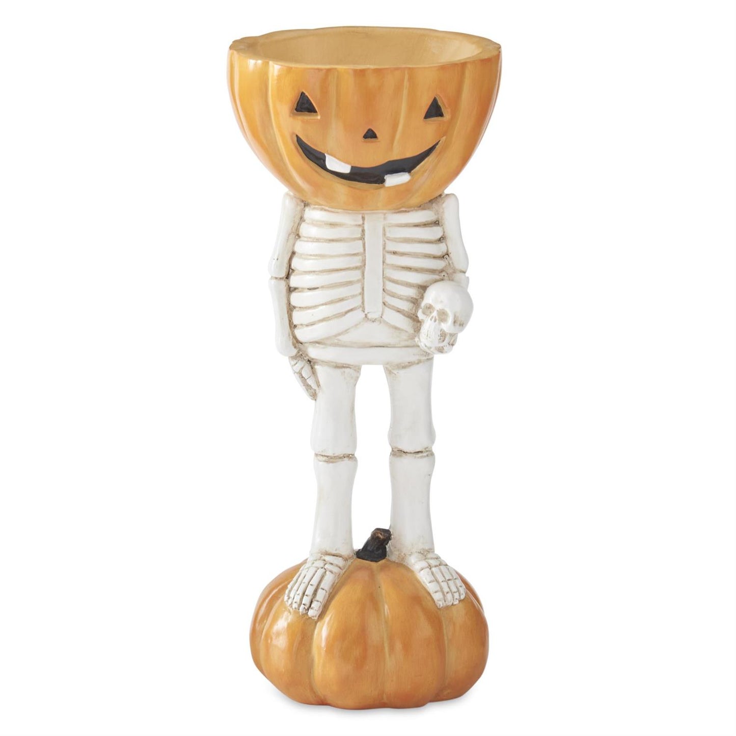 A Halloween decorative skeleton figurine standing on a pumpkin, with a carved jack-o'-lantern head that is a bowl and a small skull in one hand