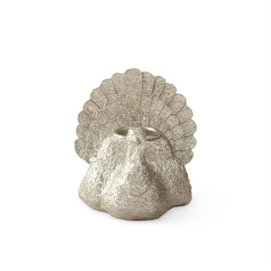 Decorative silver turkey-shaped candle holder on a white background