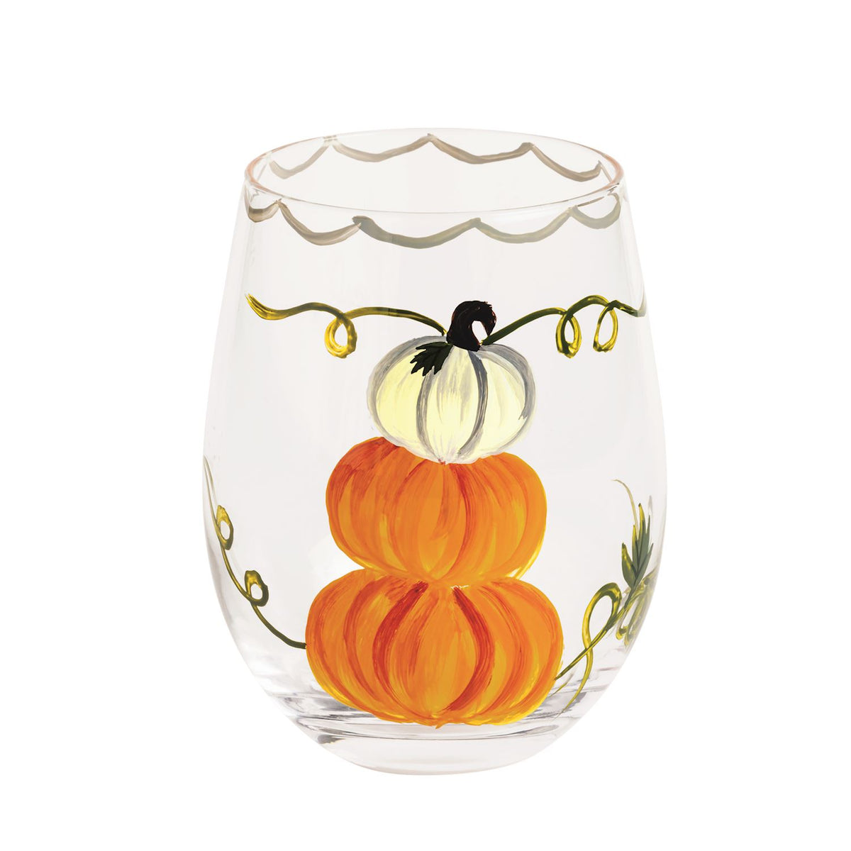 Clear stemless wine glass with a stack of 3 painted pumpkins on a white background