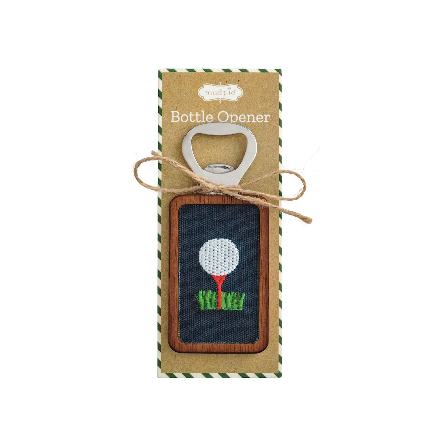 A golf-themed bottle opener presented on its kraft paper packaging card. The opener features a stitched design of a white golf ball on a red tee over green grass, set in a brown wooden frame.