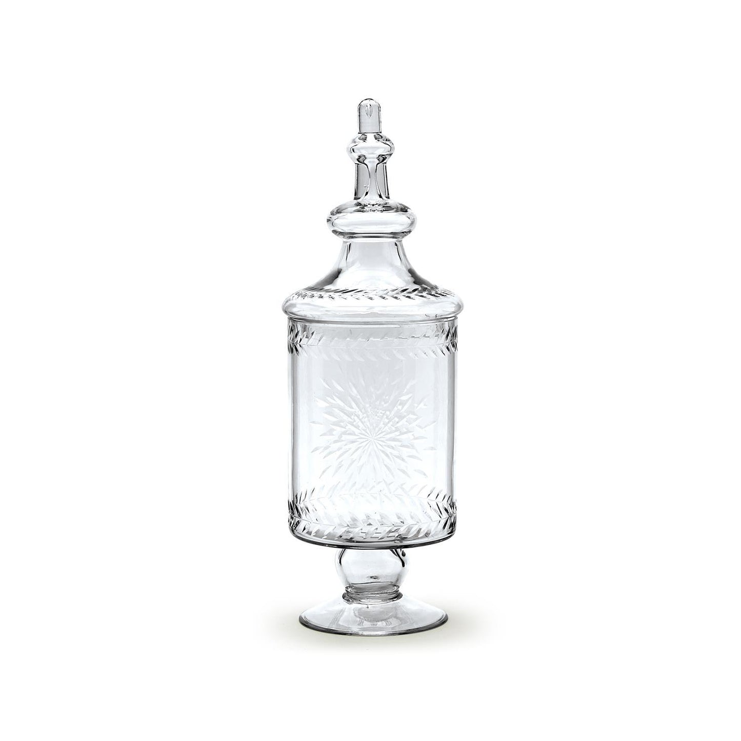 A clear glass apothecary jar with a lid, featuring etched designs and used as a decorative piece.