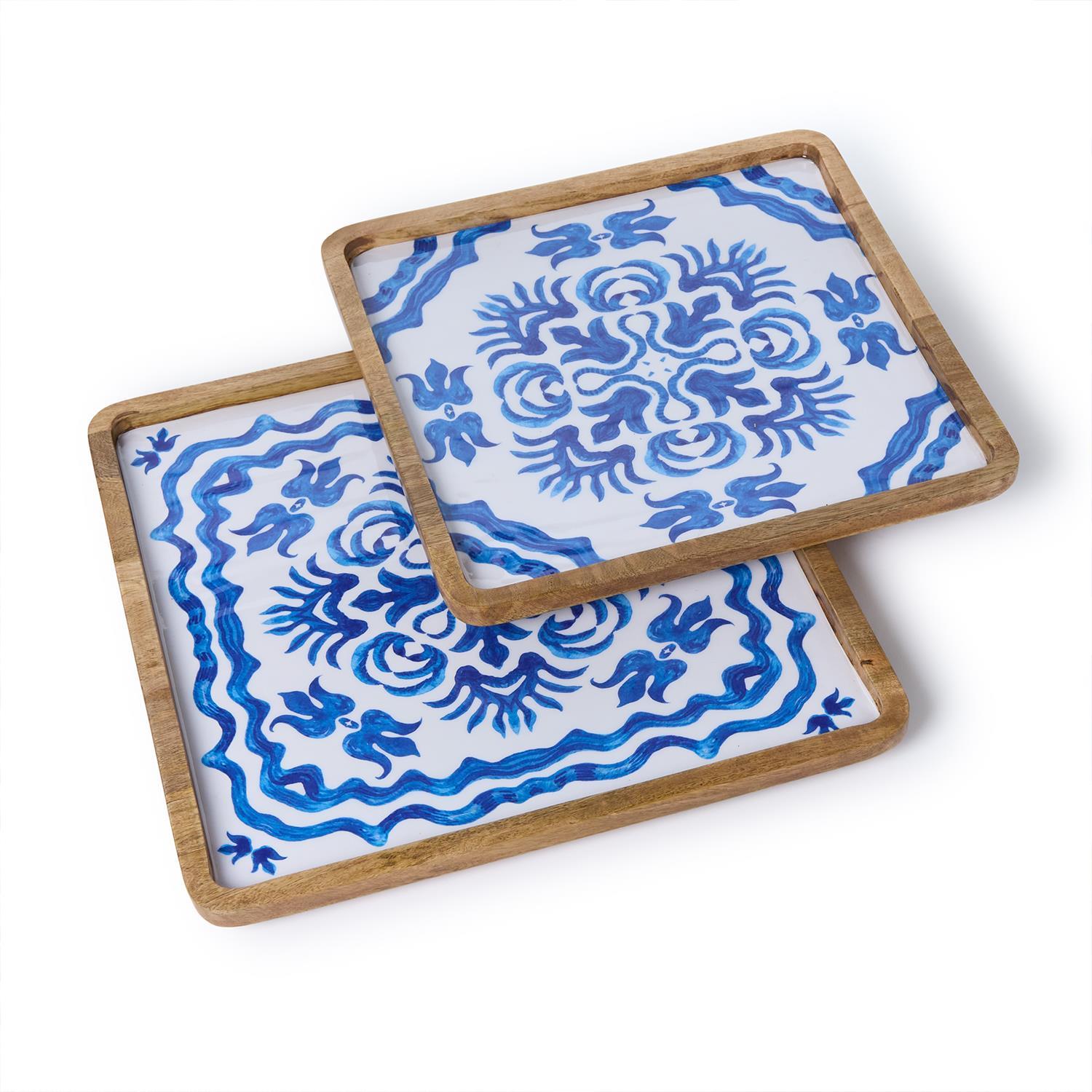 2 tile trays with a blue and white design made of mango wood and food safe enamel