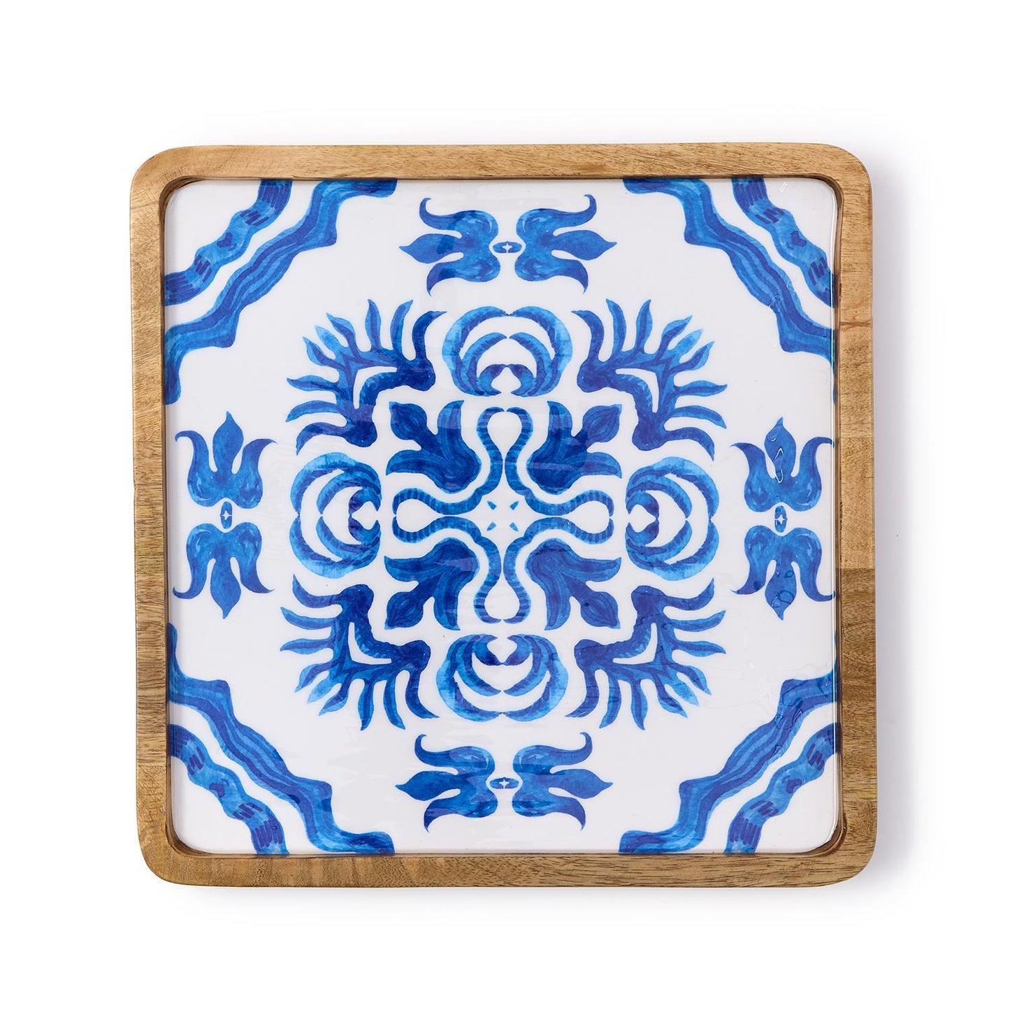 Tile tray with a blue and white pattern on a white background and a mango wood edge