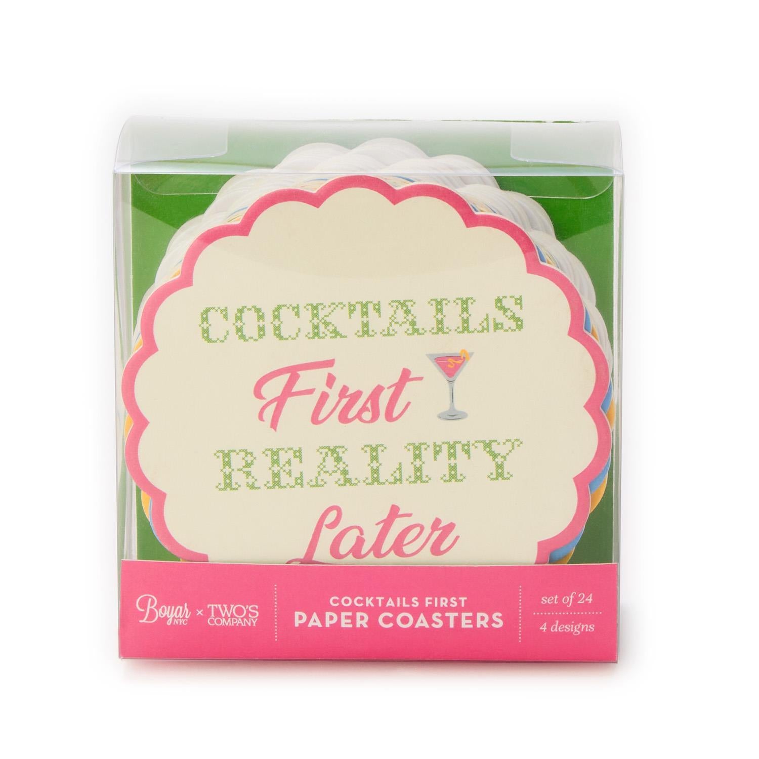 Pack of paper coasters with 'Cocktails First, Reality Later' text on a white background
