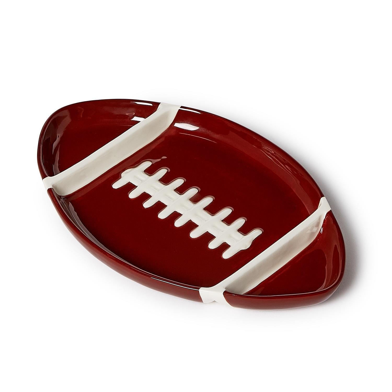 Football-shaped plate with white laces and 3 sections