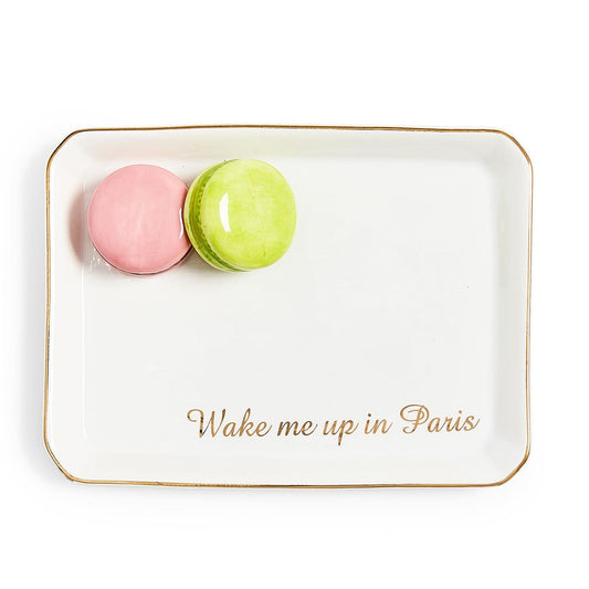 Rectangular white tray with gold text 'Wake me up in Paris' featuring two colorful macarons on a white background.