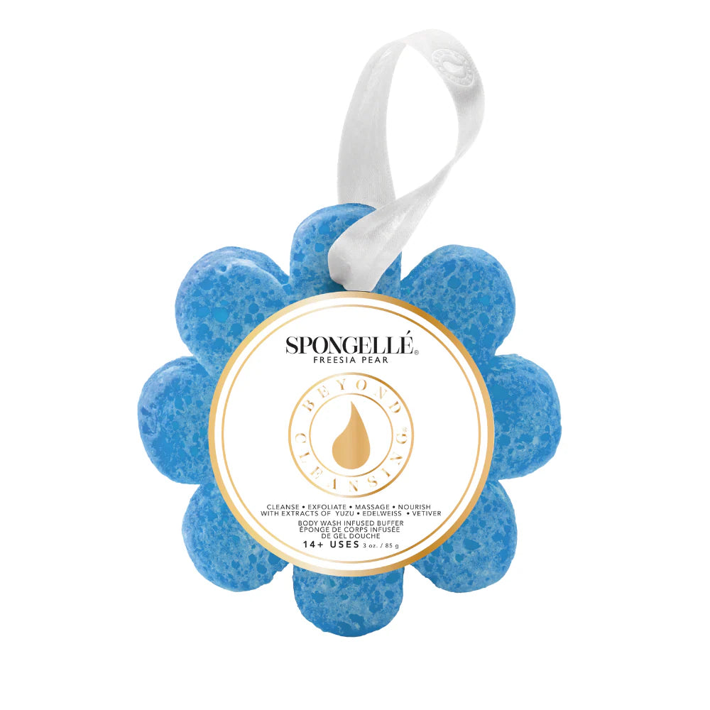 spongelle blue sponge with a label with the words Freesia Pear