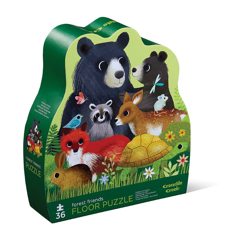 A colorful box of a 36-piece Crocodile Creek floor puzzle depicting various forest animals such as bears, birds, and a turtle.