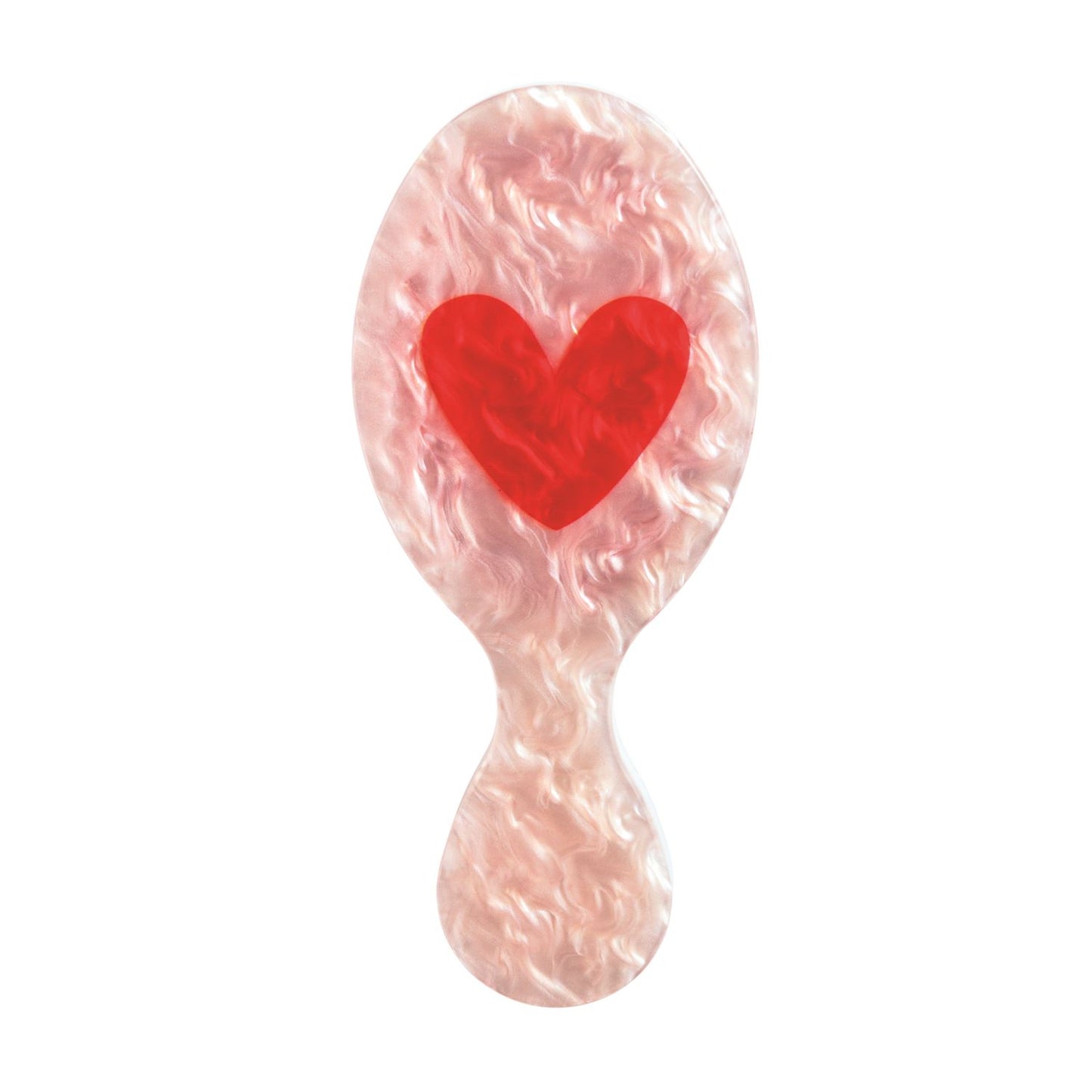 A Mudpie pearlescent pink hairbrush with a textured, marbled shell-like finish and a bright red heart printed in the center, isolated on a white background.