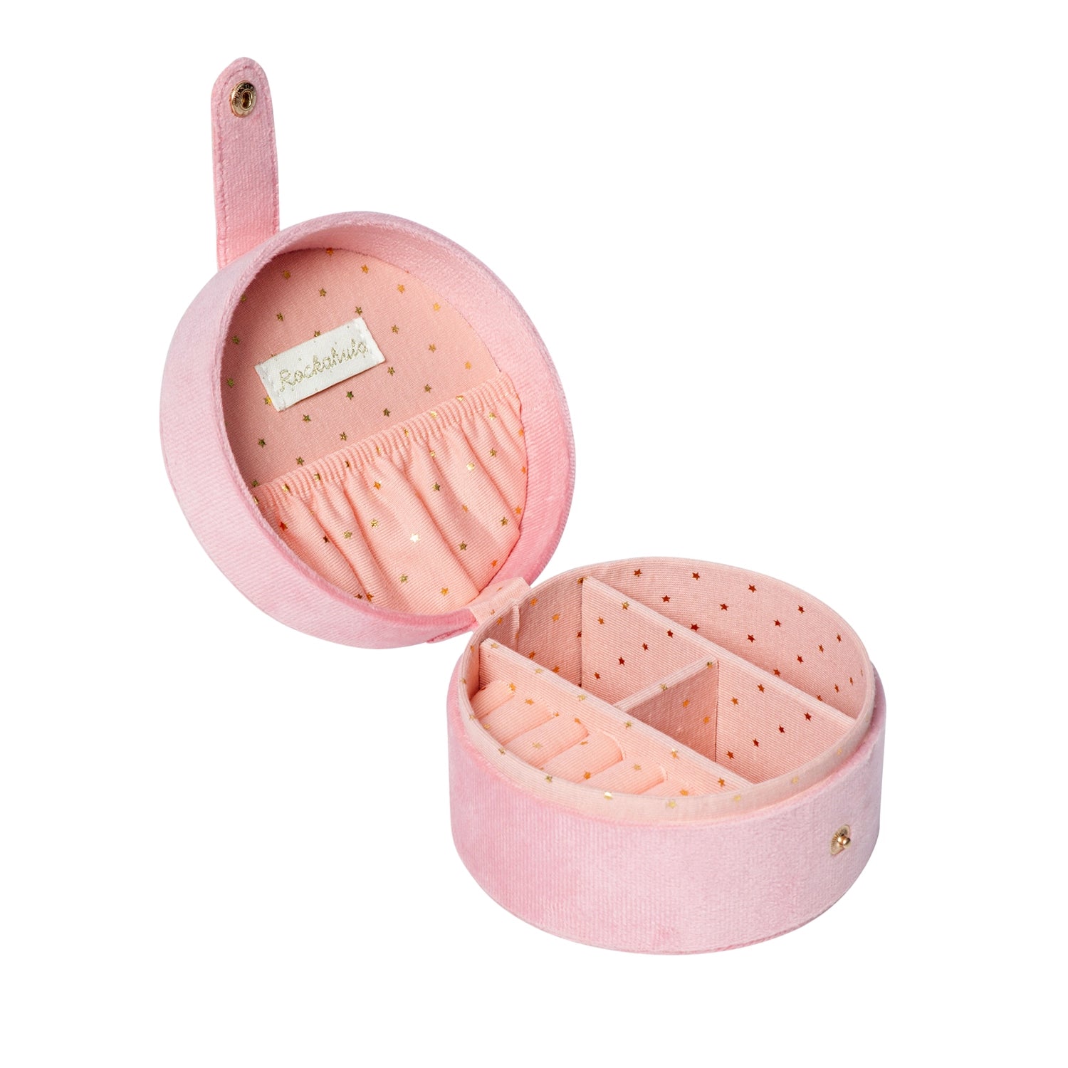 Inside of a rockahula pink circluar ballet jewelry box with separate compartments in a pink star pattern