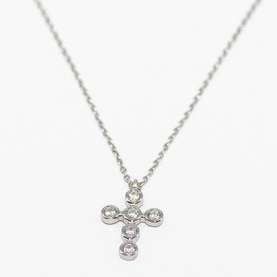 Meghan Browne Abi silver chain necklace with a silver cross featuring clear crystals