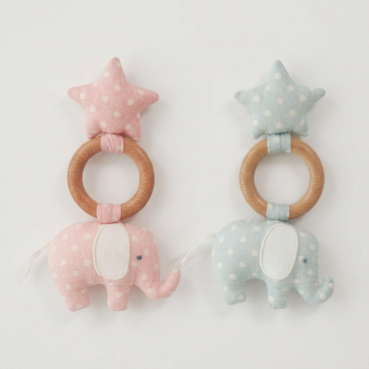 Two star-shaped baby teething rings with elephant toys by alimrose on a light background