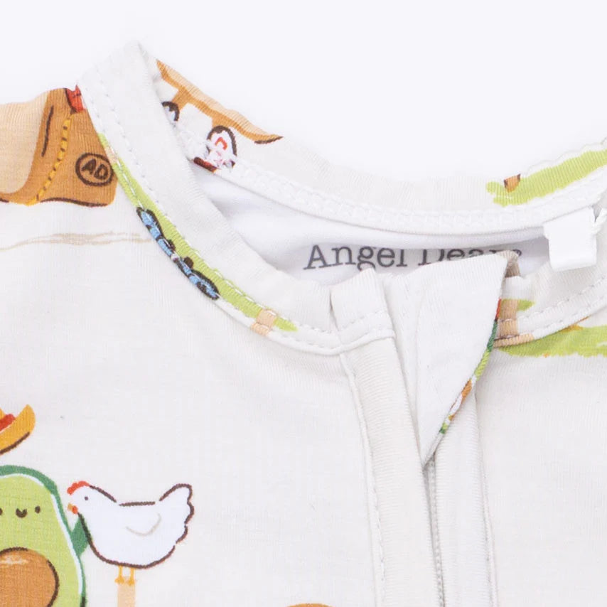 Close-up of the closure on an Angel Dear Avacado Toast American Gothic 2 Way Zipper Footie