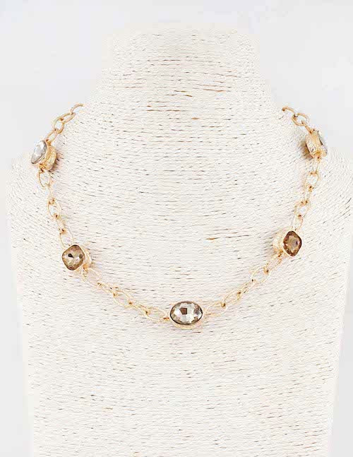 meghan browne bam-tp gold necklace with topaz stationed stones