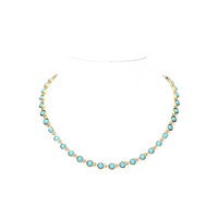Meghan browne CREW-TQ necklace with a gold chain and closely placed turquoise stones