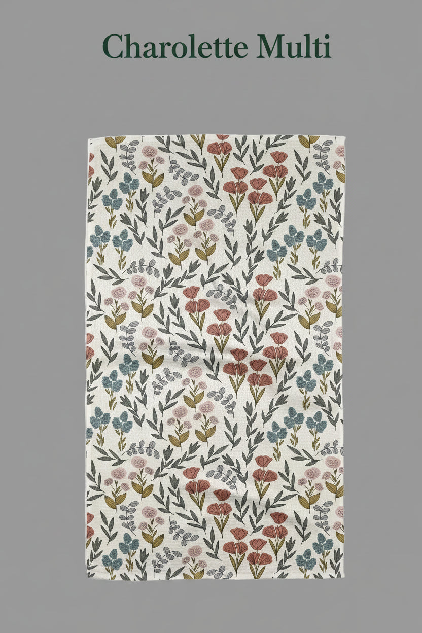 Geometry charolette multi tea towel Floral patterned towel on a white background
