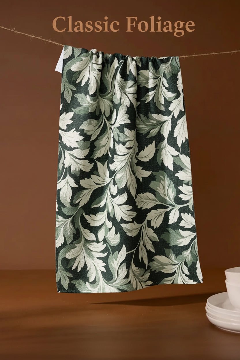 Geometry classic folliage tea towel with Floral patterned curtain hanging against a brown background with white plates on a table.