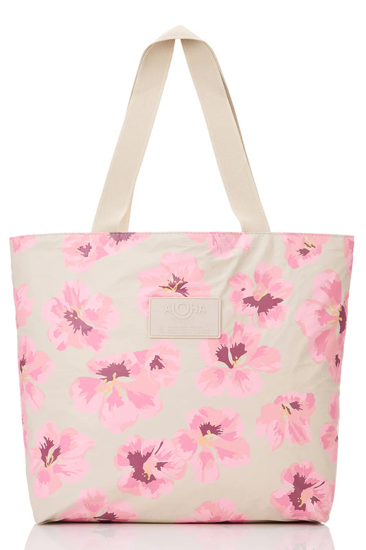 Floral tote bag with pink flowers on a beige background